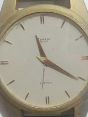 2 Jewels Wall clock in the shape of a large watch (length 78 cm) Modern de luxe