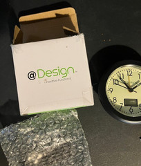 Design Branded Quartz Alarm Clock Features A Black Frame With Hybrid Dial (New)